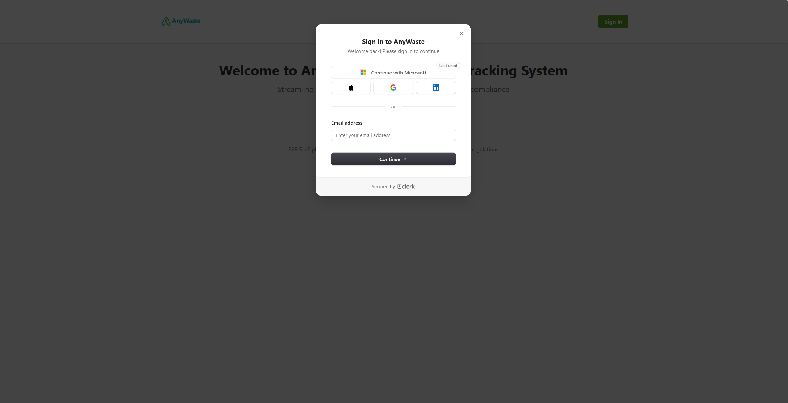 AnyWaste sign-in modal — Continue with Microsoft, Google, Apple or LinkedIn, or sign in with email; secured by Clerk.